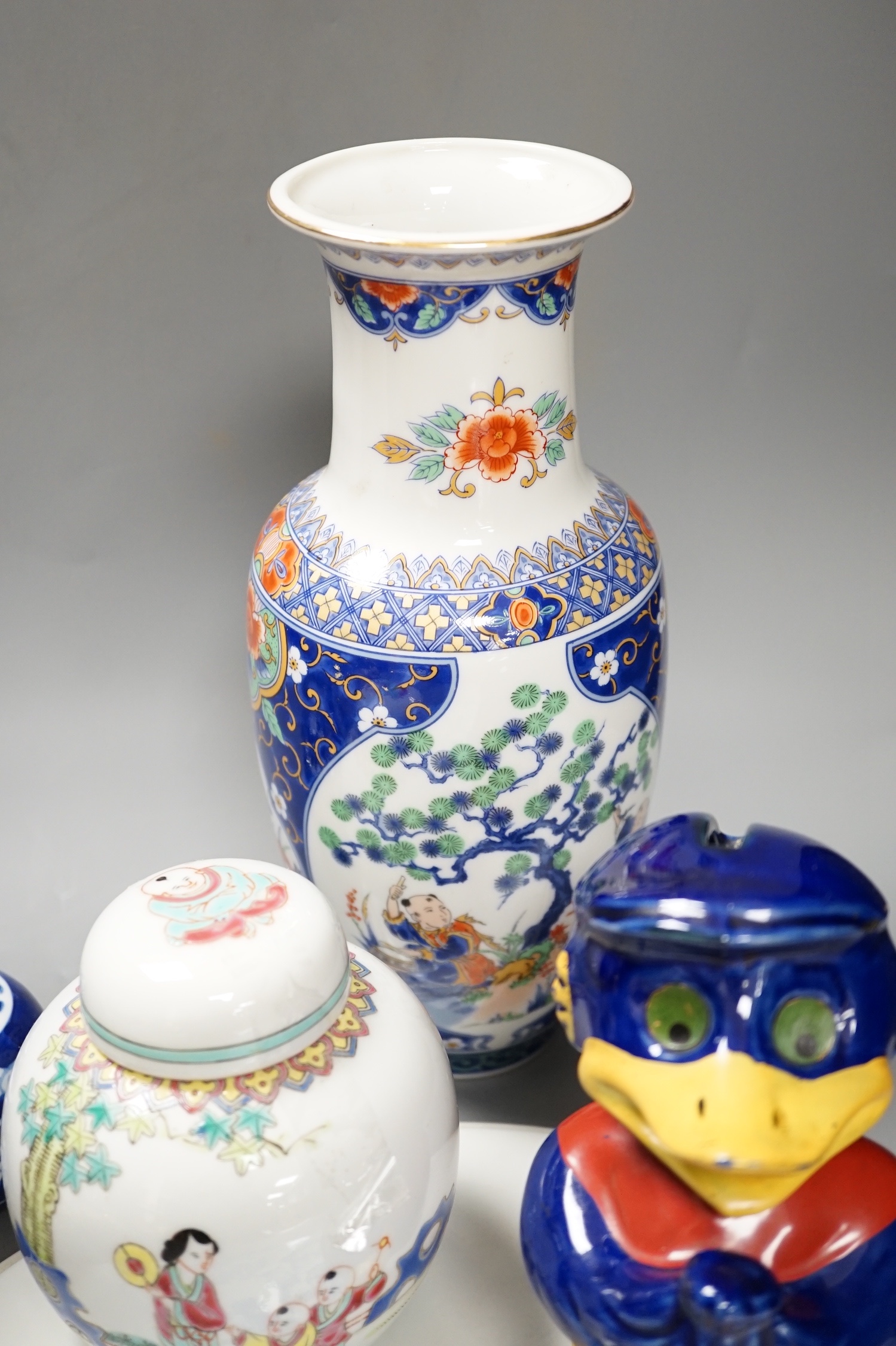 A group of 20th century Chinese and Japanese ceramics, including a blue and white circular plaque, 31 cm diameter